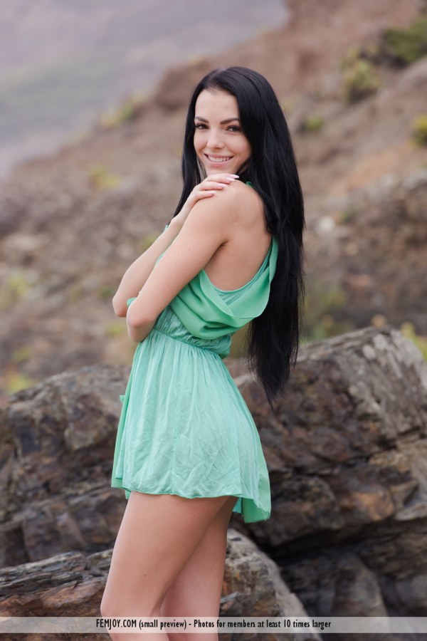 Sapphira A – Chick undresses on beach.