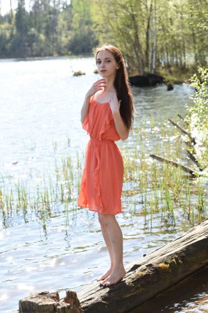 Naked chick at the river. photo 1