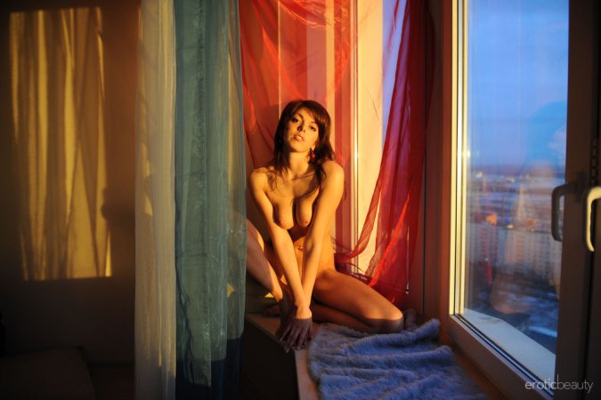 Naked girl on window-sill photo 4